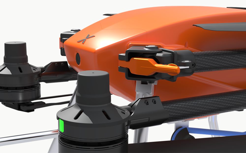 Orange quick-release latch locking a carbon fibre arm to the SPD25 body