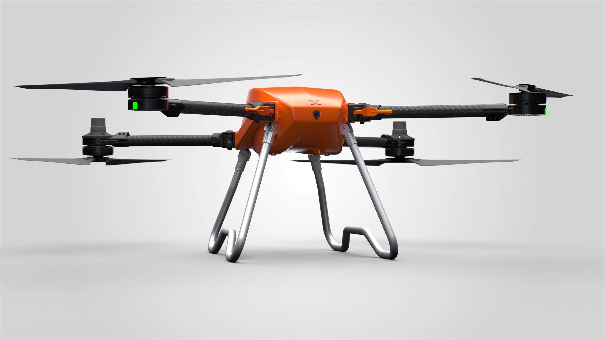 ProxGrid SPD25 pressure washing drone, front three-quarter view with arms extended